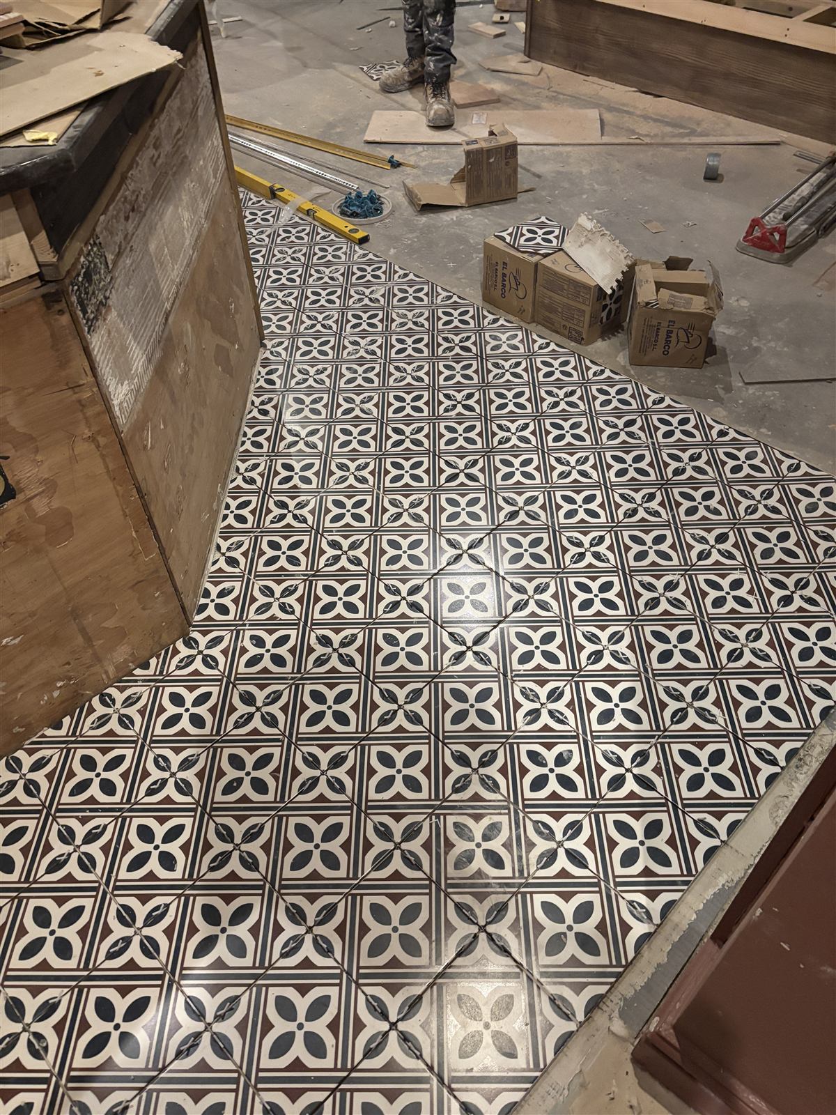 Patterned floor tiling in progress, Chorley